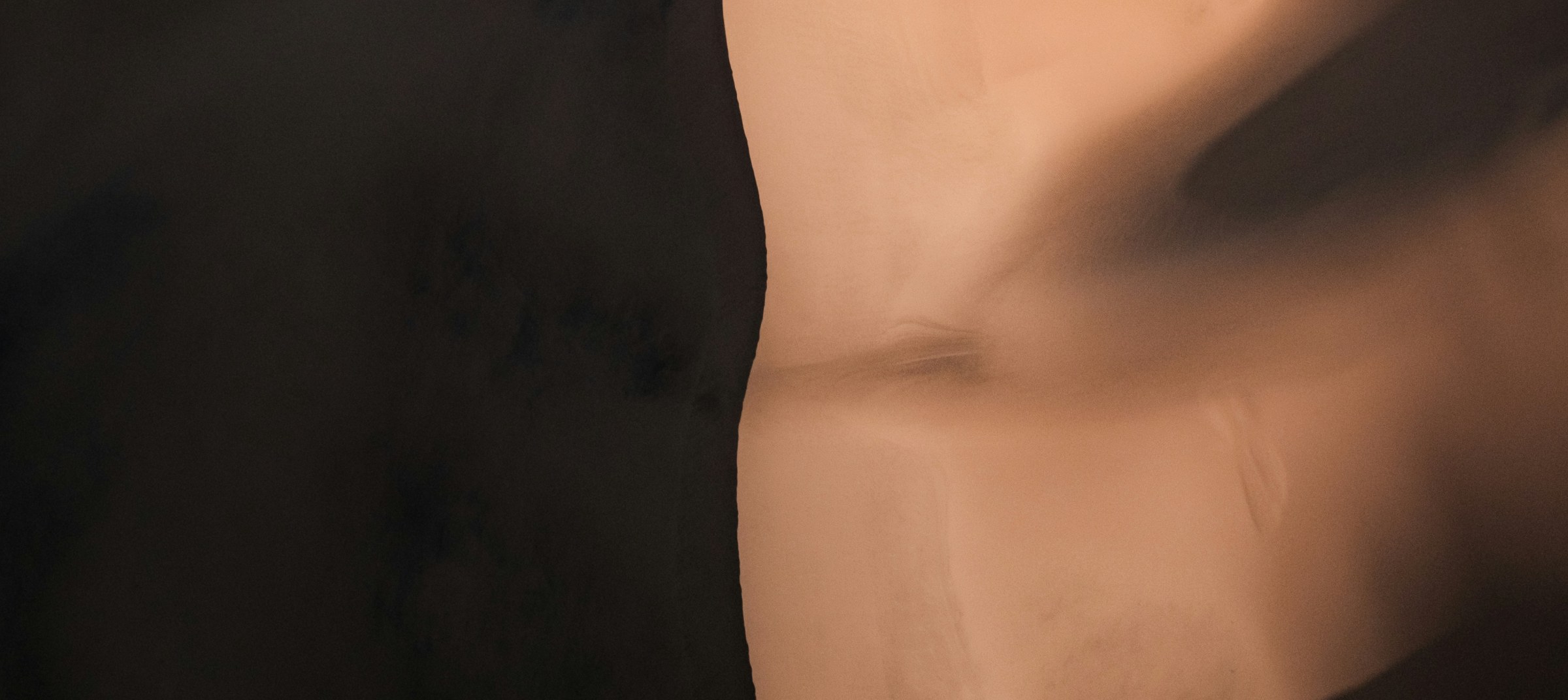 A soft dune cradling a central point